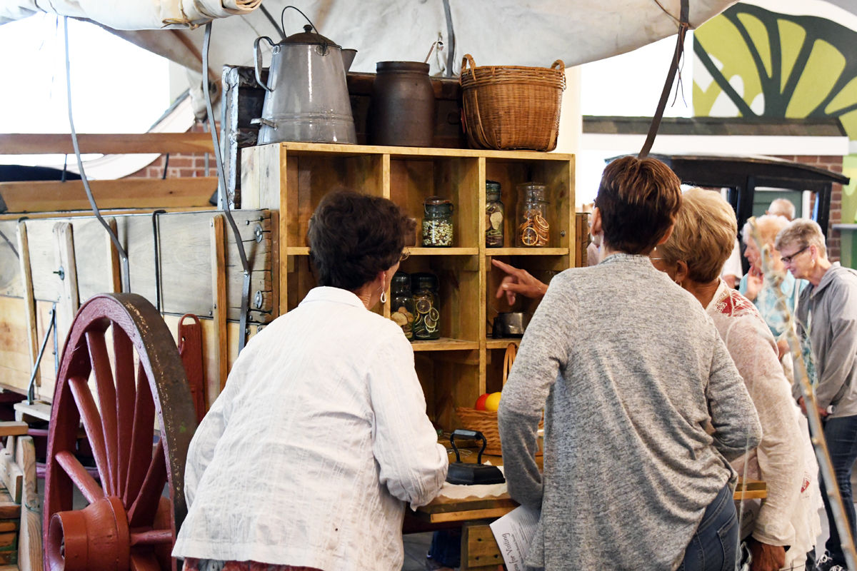 087 Fun Club travelers examine the provisions pioneers might have had on the journey west.JPG